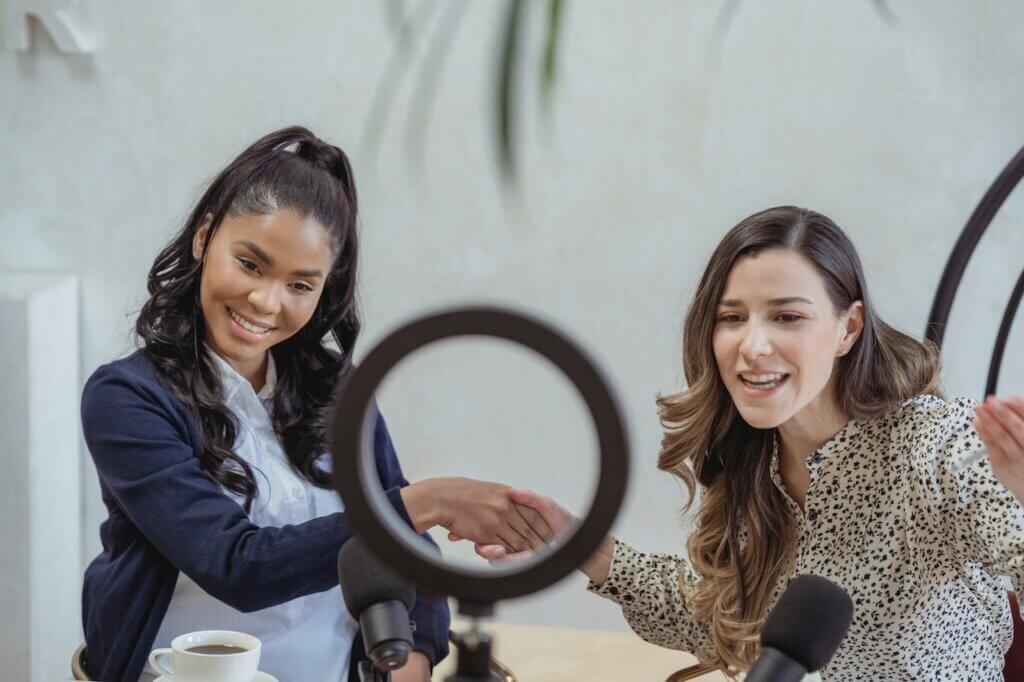 Two ladies in front of a ring light - Stanford Digital Economy Lab is hiring a Content Contributor