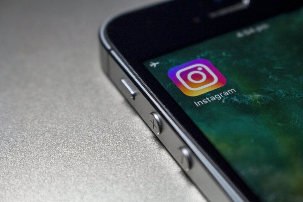 A picture of a phone showing the Instagram App - Updates