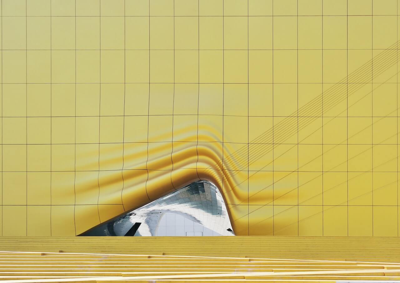 Architectural rendering of a yellow parametric structure